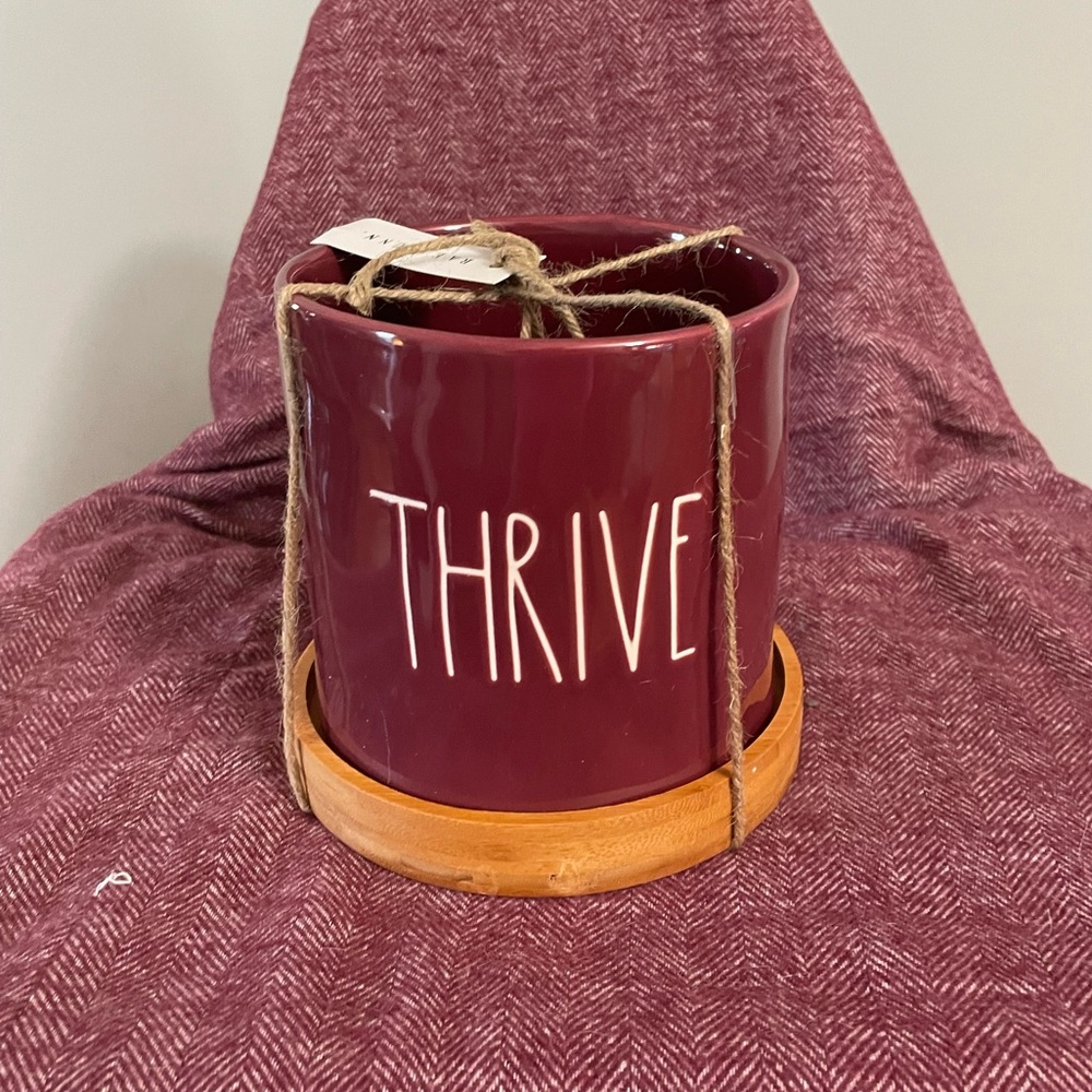 Rae Dunn maroon “Thrive” planter with wooden tray.